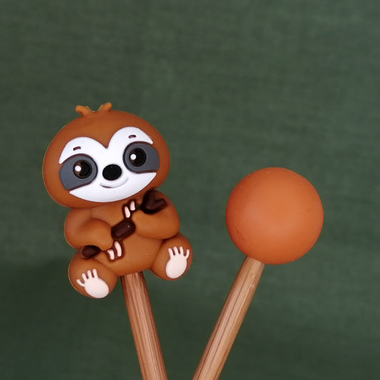 Sloth needle stoppers