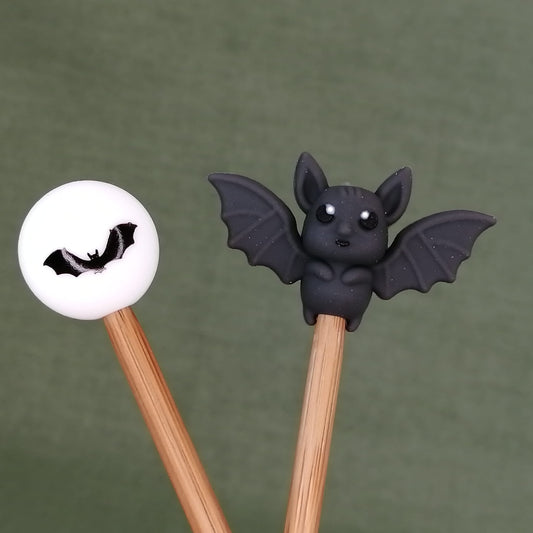 Bat needle stoppers