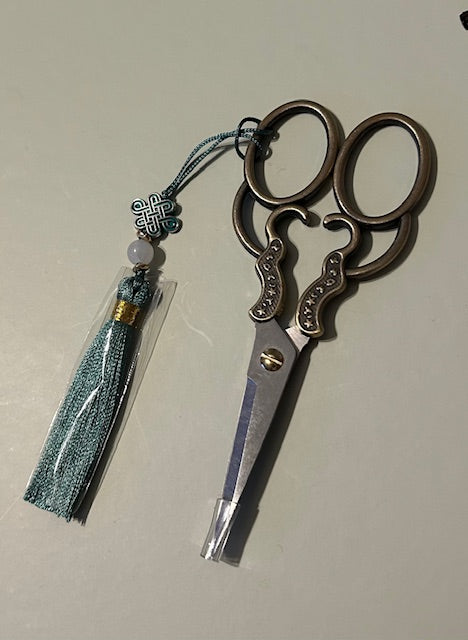 12cm decorative handle scissors with a green tassel